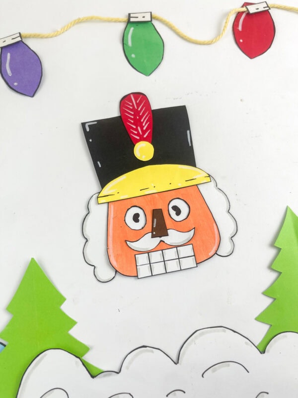 Finished nutcracker displayed with Christmas trees and lights