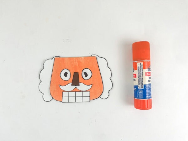 Nutcracker face assembled with hair, mustache, and teeth