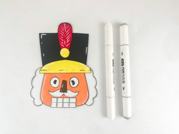 Nutcracker decorated with white marker details