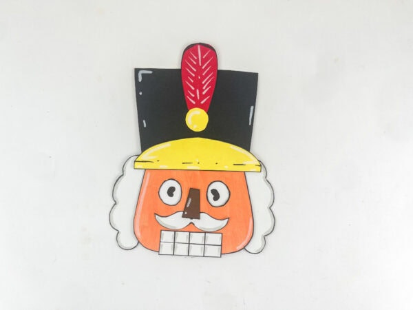 finished Christmas nutcracker craft with movable eyes