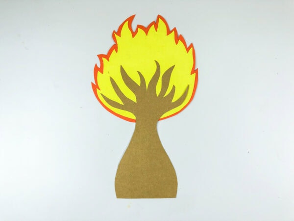 Brown tree attached over the flame