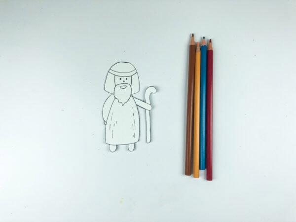 Moses paper figure with colored pencils