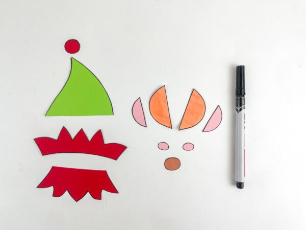 Colored elf craft pieces outlined with a black marker.